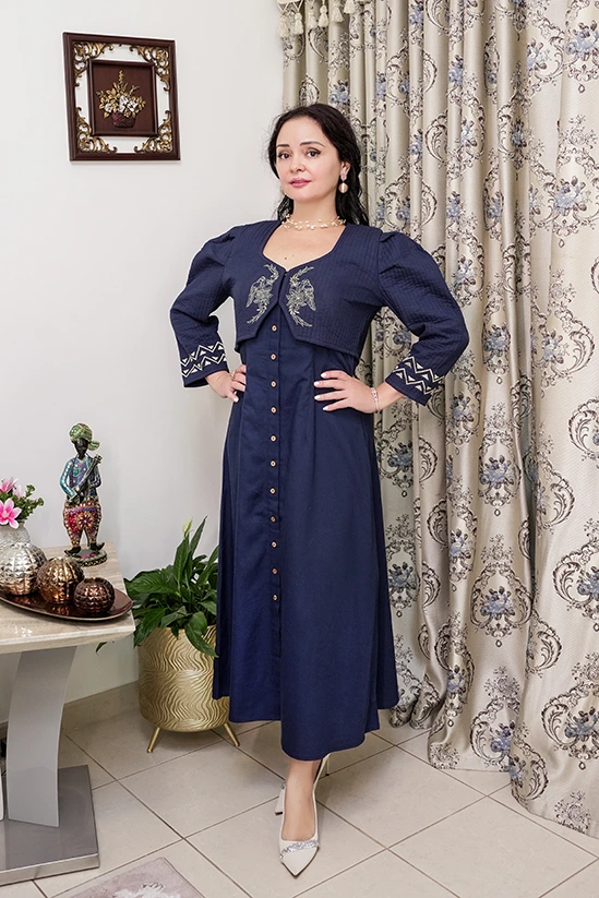 A line dress with quilted jacket
